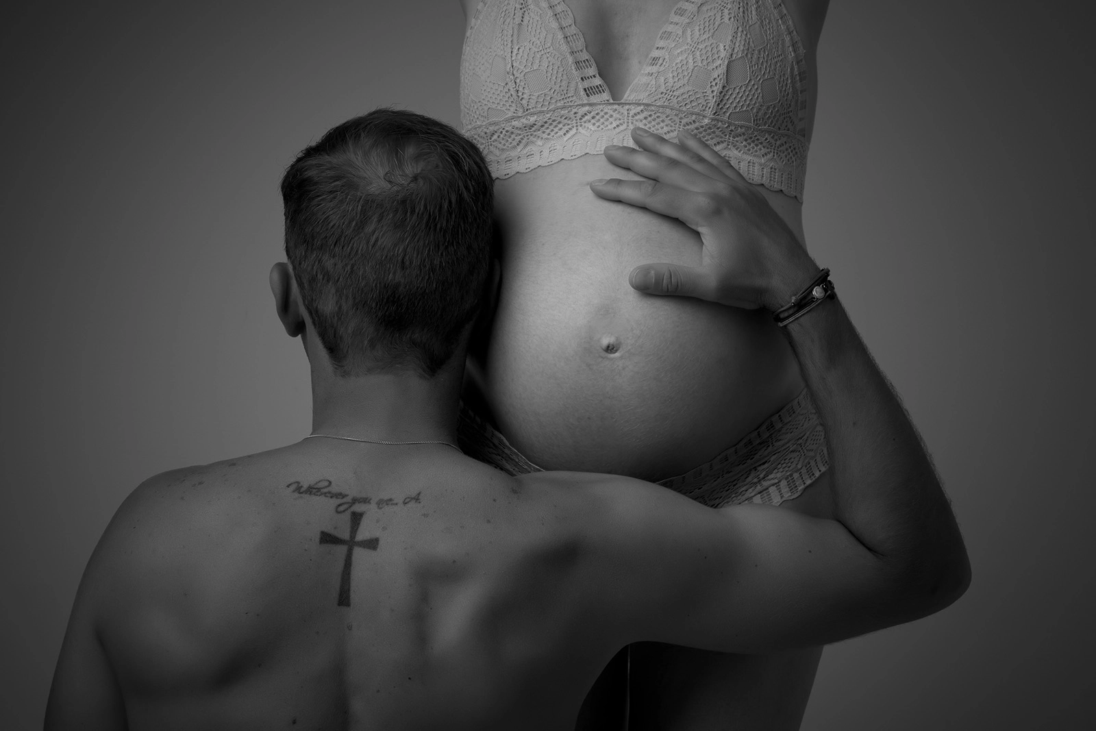 Papa et enfants participant à une séance photo grossesse